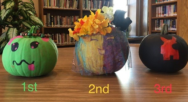 3 painted pumpkins